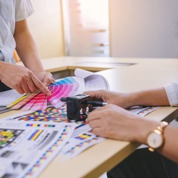 worker-checking-print-quality-media-graphics-proof-print-color-tone-printing-industry